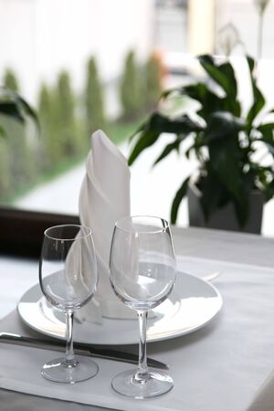 the table setting in restaurant Cutlery near the windowの写真素材