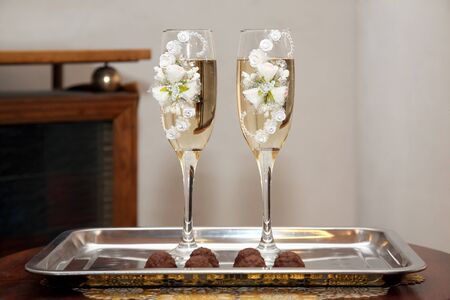 two decorated wedding champagne glassの写真素材