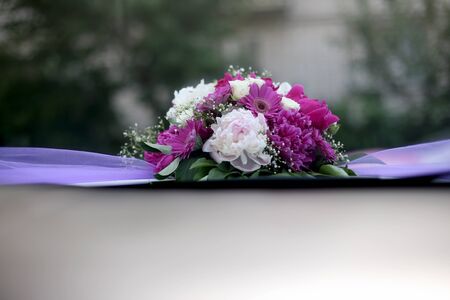 beautiful wedding bouquet lies on the surfaceの写真素材
