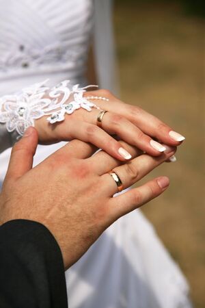 hands of the bride and groom togetherの写真素材