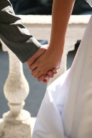 hands of the bride and groom togetherの写真素材