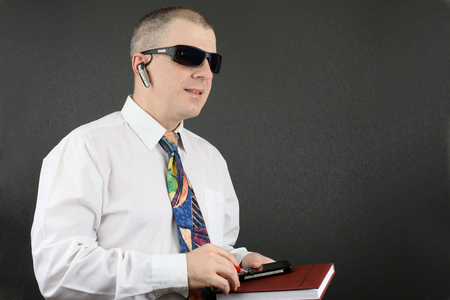 businessman in white shirt and sunglassesの写真素材
