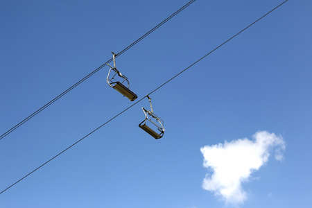 cable car for skiers in the skyの写真素材