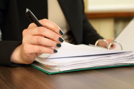 hand of business woman with document viewerの写真素材