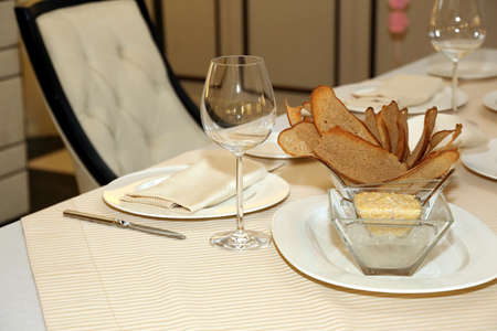 serving dishes on the table in the restaurantの写真素材