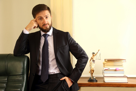 successful lawyer in his officeの写真素材