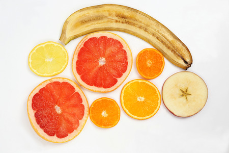 cut across the fruit on white backgroundの写真素材