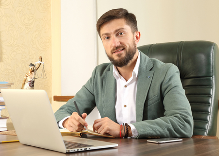 successful lawyer at work in the officeの写真素材