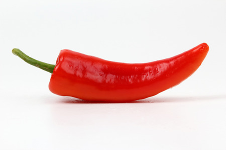 red hot peppers on white backgroundの写真素材