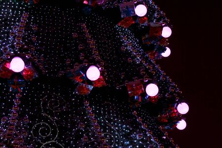 decorated with baubles and garlands Christmas tree