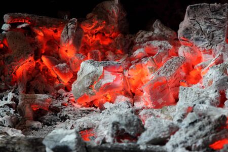 burning red coals of a fire