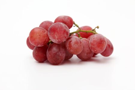 bunch of grapes on white backgroundの写真素材
