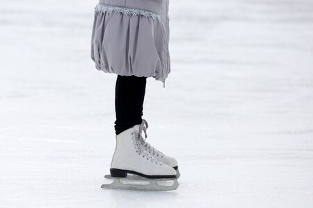 feet skating on the ice rinkの写真素材
