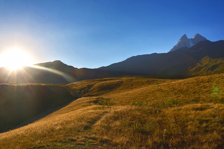 Sunny dawn in the Caucasus mountainsの写真素材