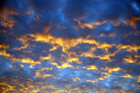 the expressive contrast of the clouds in the sky