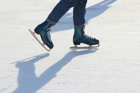 Foot ice-skating person on the ice rinkの写真素材