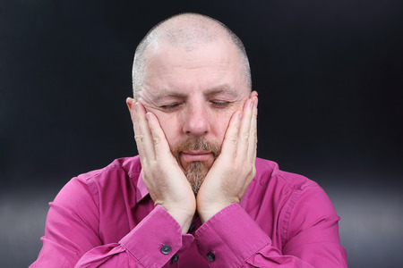 Portrait of a man with his eyes closedの写真素材