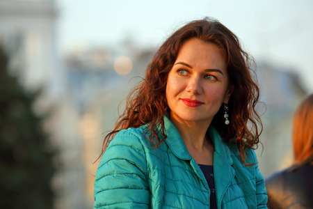 Portrait of a beautiful girl in the setting sunの写真素材