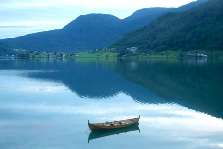 wooden boat on the lake