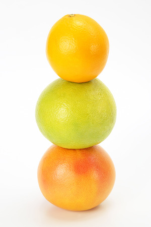 different citrus fruits on white backgroundの写真素材