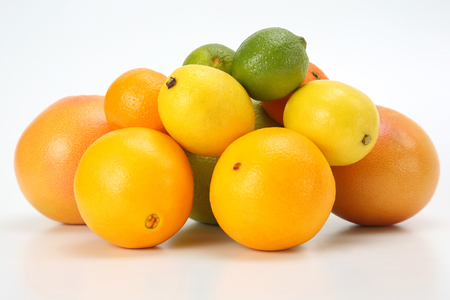 different citrus fruits on white backgroundの写真素材