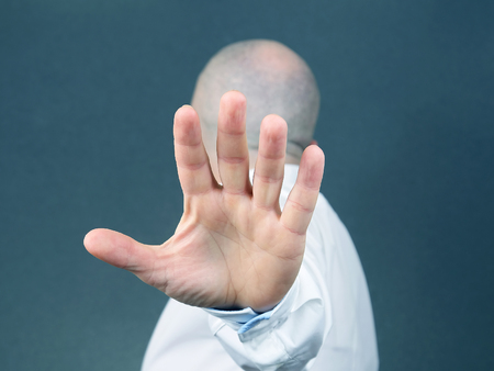 man negative hand gesture and turned away