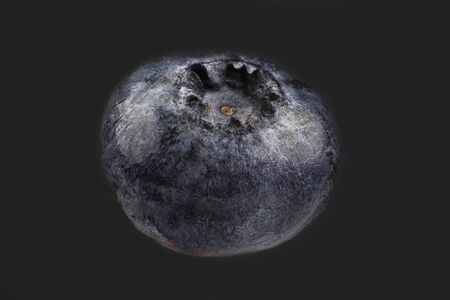 Macro photography of blueberries on a dark background. Healthy and vitamin foodの写真素材