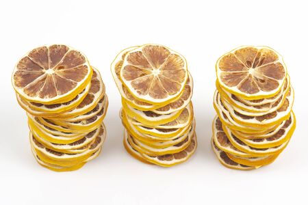 large number of dried lemon slices on a white background. vitamin fruit foodの写真素材
