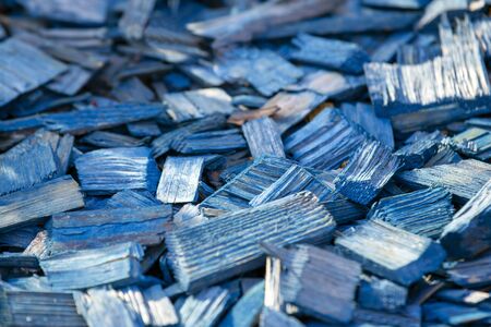 chopped pieces of colored wood for soil decorationの写真素材