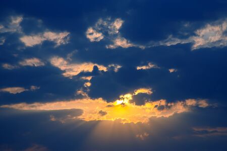 Colorful sunset in the evening sky. The nature and beauty of clouds