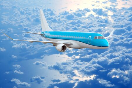 passenger jet plane flying in the evening sky at sunset. commercial airlineの写真素材