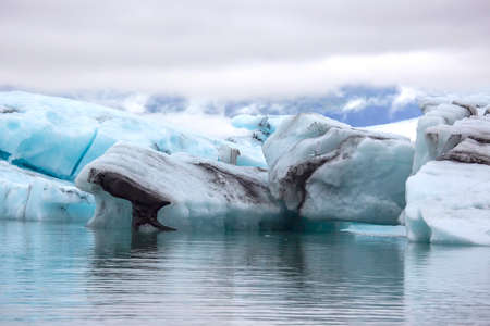 blue Ice on the shore of the ice lagoon in Iceland