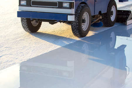 special machine for cleaning ice on an ice rink at work. Transport industry