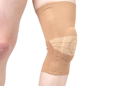 brace to support the injured knee. medicine and sports. limb injury treatment