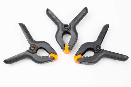 black pegs on a white backgroundの写真素材