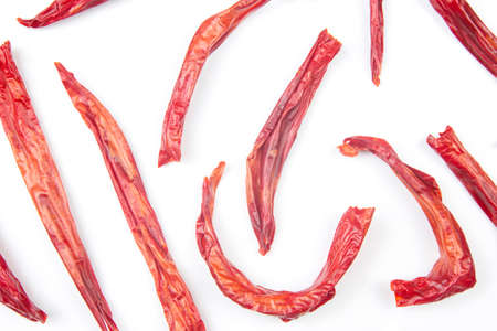 red dried hot peppers on white backgroundの写真素材