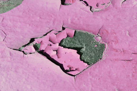 cracked paint on the wall. abstract background textureの写真素材