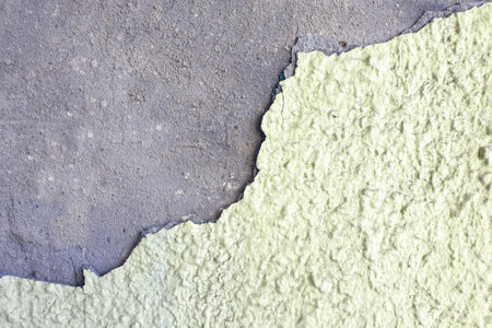 cracked paint on the wall. abstract background textureの写真素材