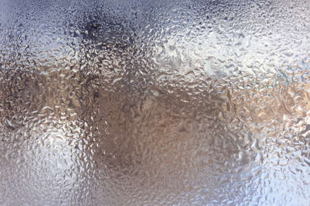 ice-frozen glass. background natural texture