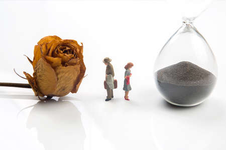 miniature people. concept of family people in relationships on a white background. the problem of fidelity in marriage.の写真素材