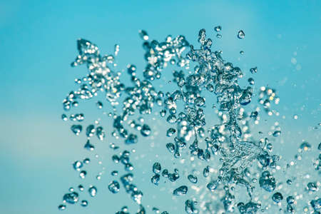 drops of the fountain in the skyの写真素材
