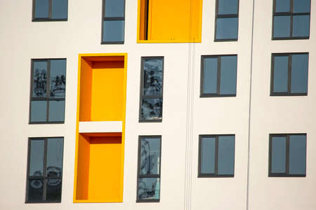 Facade of a new multi-story residential building. architecture and modern constructionの写真素材