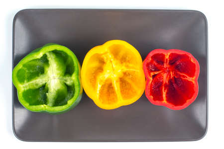 Fresh bell peppers on a plate. Vitamin wholesome food.の写真素材