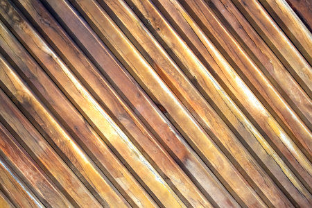 background and texture of the wall of wooden planksの写真素材