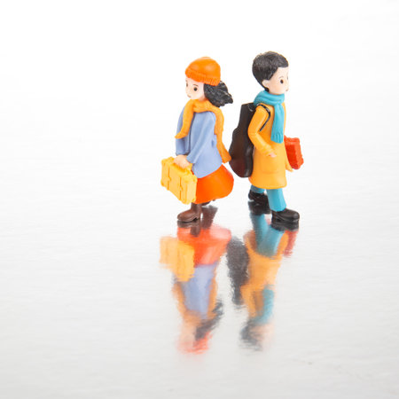 miniature people. figures for the game. romantic couple of young people. boy and girl walking...