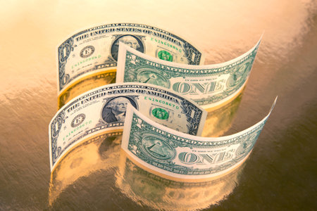 labyrinth of dollars on a golden background. financial wall of success. business concept
