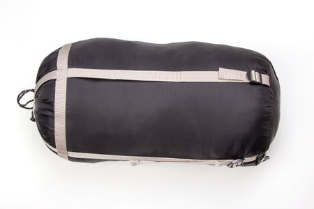 folded sleeping bag on a white background. items for tourism and campingの写真素材
