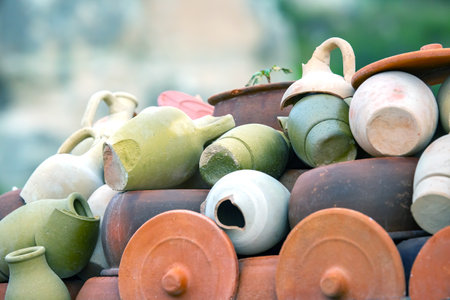 stacked together broken clay potsの写真素材