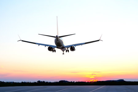 Passenger aircraft landing approach to the airport. Airplane flight in the sky.