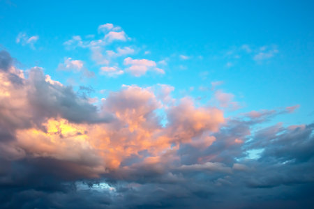 Lush colored clouds in the sky before sunsetの写真素材
